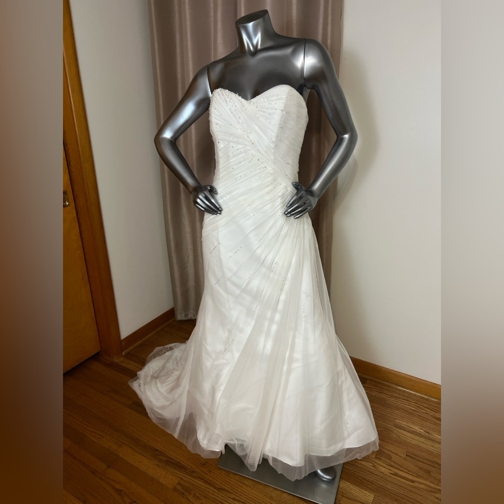 Alfred Angelo style 2387 ivory strapless corset lace up wedding gown.